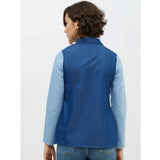 Blue denim patchwork long-sleeve shirt on hanger