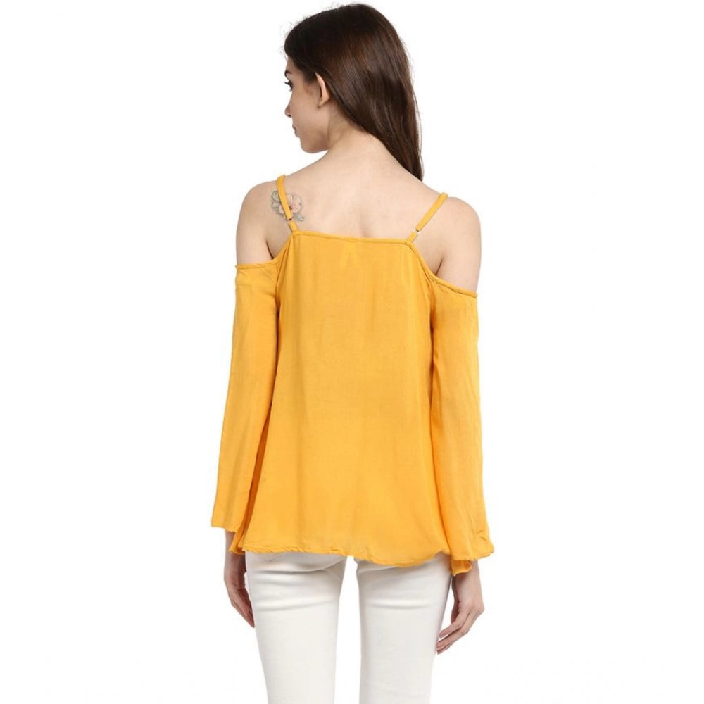 Mustard yellow rayon embellished cold shoulder regular top for women, detailed view showcases intricate pattern