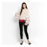 Off-white and red rayon crepe printed ruffle sleeve top for women, vibrant floral pattern on display