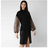 Black polyester animal print long sleeves top with closed neck