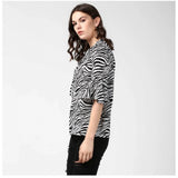 Black & White animal print bell sleeve top on model, women's polyester fashion top with collar neckline