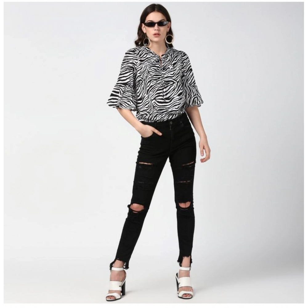 Black & White animal print bell sleeve top on model, women's polyester fashion top with collar neckline
