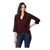 Maroon polyester solid 3/4th sleeves top for women's casual wear, close-up view
