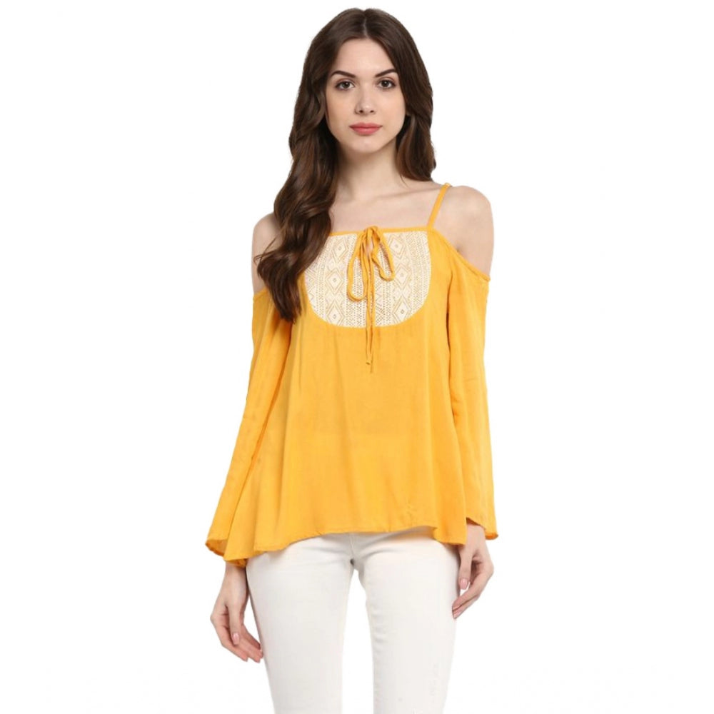 Mustard yellow rayon embellished cold shoulder top for women, close-up detail