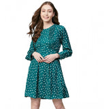 Green & white polka long-sleeve polyester dress for women, close-up on patterned fabric detail