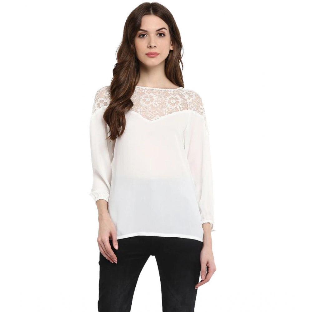 White polyester georgette self-design 3/4th sleeve regular top on mannequin