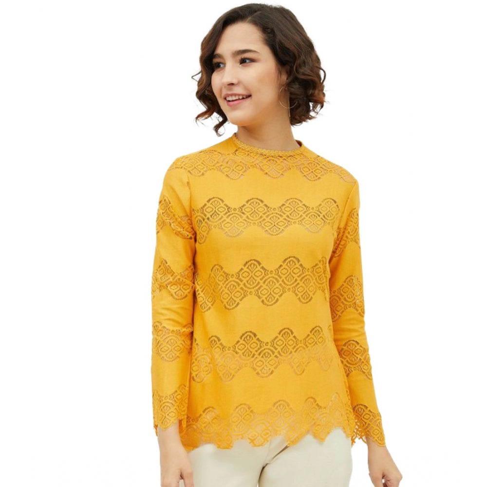Yellow cotton lace insert long sleeves top with round neck on mannequin