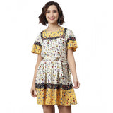 Multicolor polyester floral flutter dress with round neck, above knee length on model