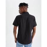 Black cotton blend men's half-sleeve solid shirt, perfect for casual wear