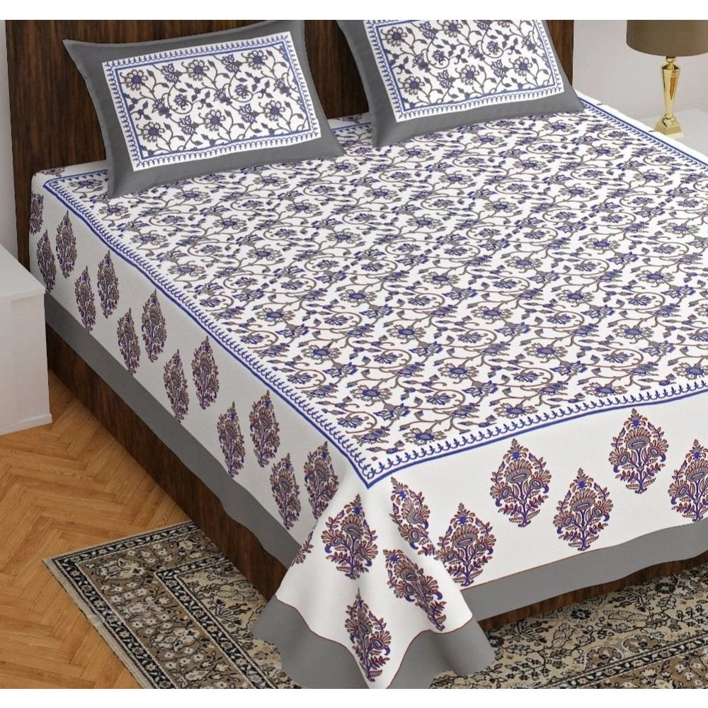 White cotton printed queen size bedsheet with 2 pillow covers (90x100 inch) featuring a vivid pattern, perfect for a stylish bedroom decor