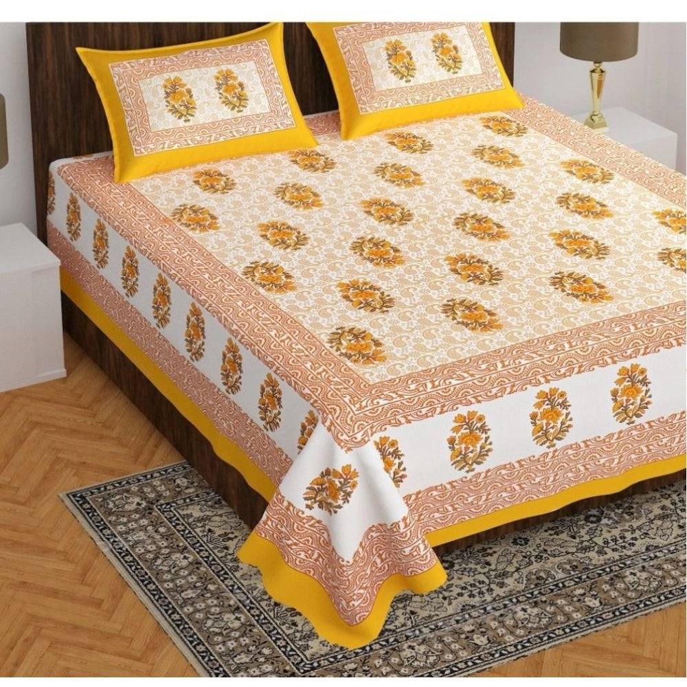 Yellow cotton printed queen size bedsheet with 2 pillow covers, 90x100 inch, 160 thread count on bed