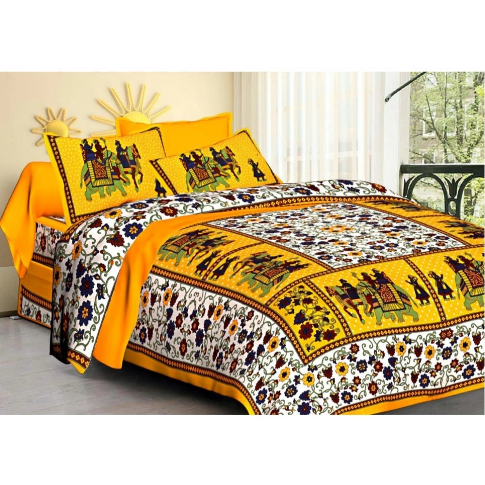 Yellow cotton printed queen size bedsheet with 2 pillow covers (90x100 inch) on display
