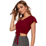 Maroon polyester solid short sleeves V-neck top for women's fashion, vibrant solid color on model