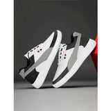 Black synthetic casual sneakers, solid lace-up design for men's sporty style