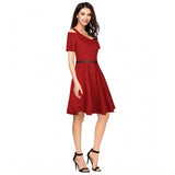 Maroon polyester solid v-neck cap sleeve dress for women on model