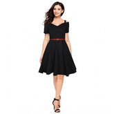 Black polyester solid v-neck cap sleeve dress for women, ideal for casual outings