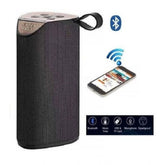 Black plastic rubber wireless TG111 Bluetooth speaker, USB chargeable audio device for modern home or outdoor settings