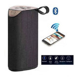 Black plastic rubber wireless TG111 Bluetooth speaker, USB chargeable audio device for modern home or outdoor settings