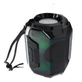 Black plastic rubber wireless Bluetooth speaker A005, USB chargeable home audio device on charging pad