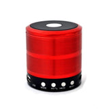 Red plastic rubber wireless Bluetooth speaker (WS887), portable audio device for music streaming, USB chargeable, on tabletop