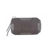 Grey plastic rubber wireless Bluetooth speaker (AO105), chargeable via USB, on tabletop