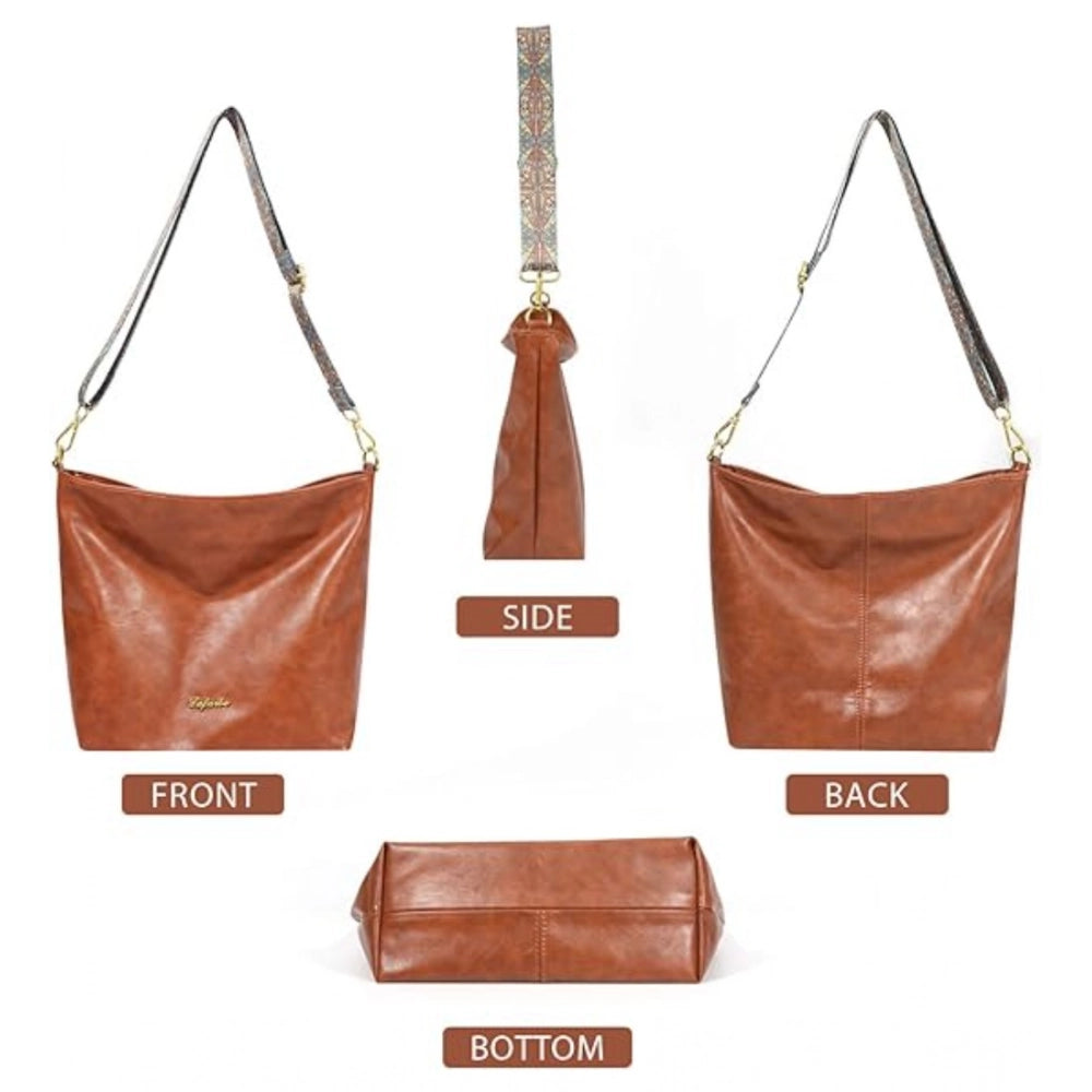 Brown PU leather medium sling bag with adjustable strap and zipper closure