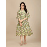 Green georgette printed round neck short sleeve dress for women, stylish casual attire on mannequin