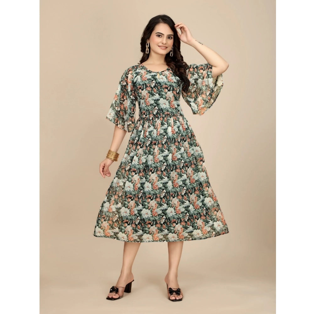 Black georgette printed round neck short sleeve dress for women, stylish below-knee length outfit on mannequin