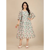 Pink Georgette printed round neck short sleeve dress for women, below knee length on mannequin
