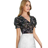 Black knitted v-neck puff sleeve top with knitting print, suitable for women's casual wear