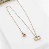Gold-plated stainless steel mini suitcase pendant on delicate chain, ideal for fashion accessories
