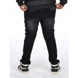Men's cotton blended solid plus size black jeans, mid rise for men's fashionable attire on model