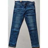 Men's blue cotton blended tapered jeans, solid pattern, mid-rise style with button closure