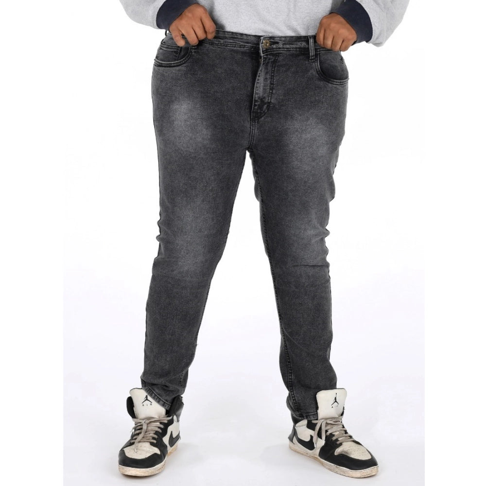Grey cotton blended solid plus size men's jeans with mid rise, suitable for casual wear