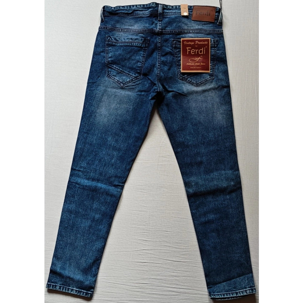Men's blue cotton blended tapered jeans, solid pattern for a stylish fit