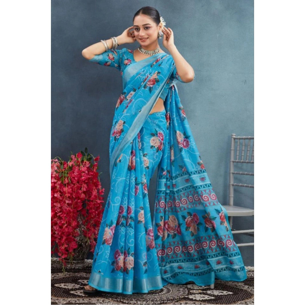 Blue linen floral printed saree with unstitched blouse, vibrant blooms on a natural backdrop