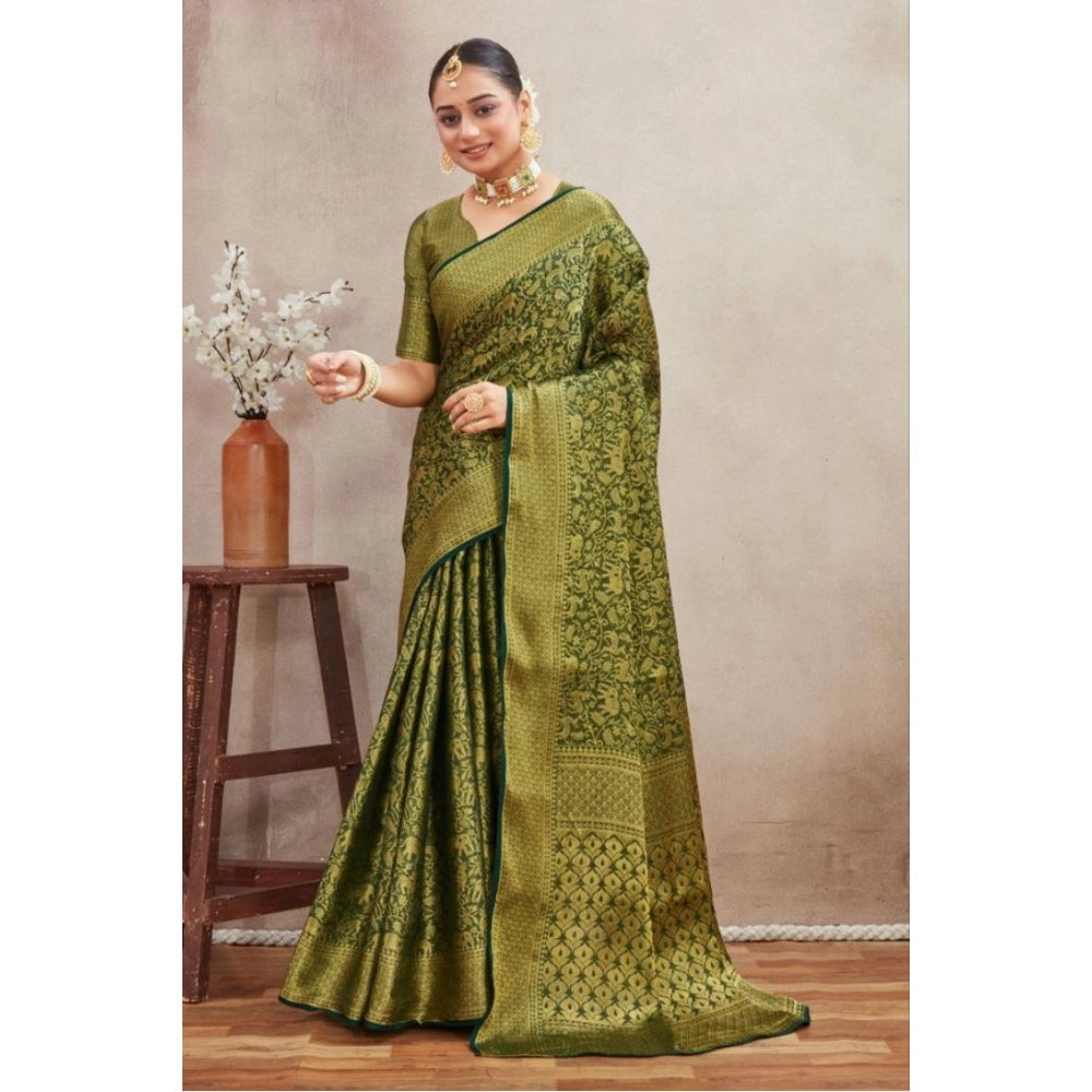 Green silk blend floral printed saree with unstitched blouse, versatile Indian fashion accessory on mannequin