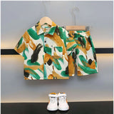 MultiColor Lycra blend printed short sleeve shirt & shorts set for kids, activewear on grass