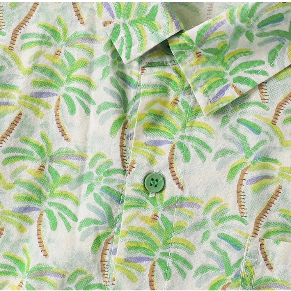 Green cotton blend printed short sleeve shirt for kids, vibrant design on display