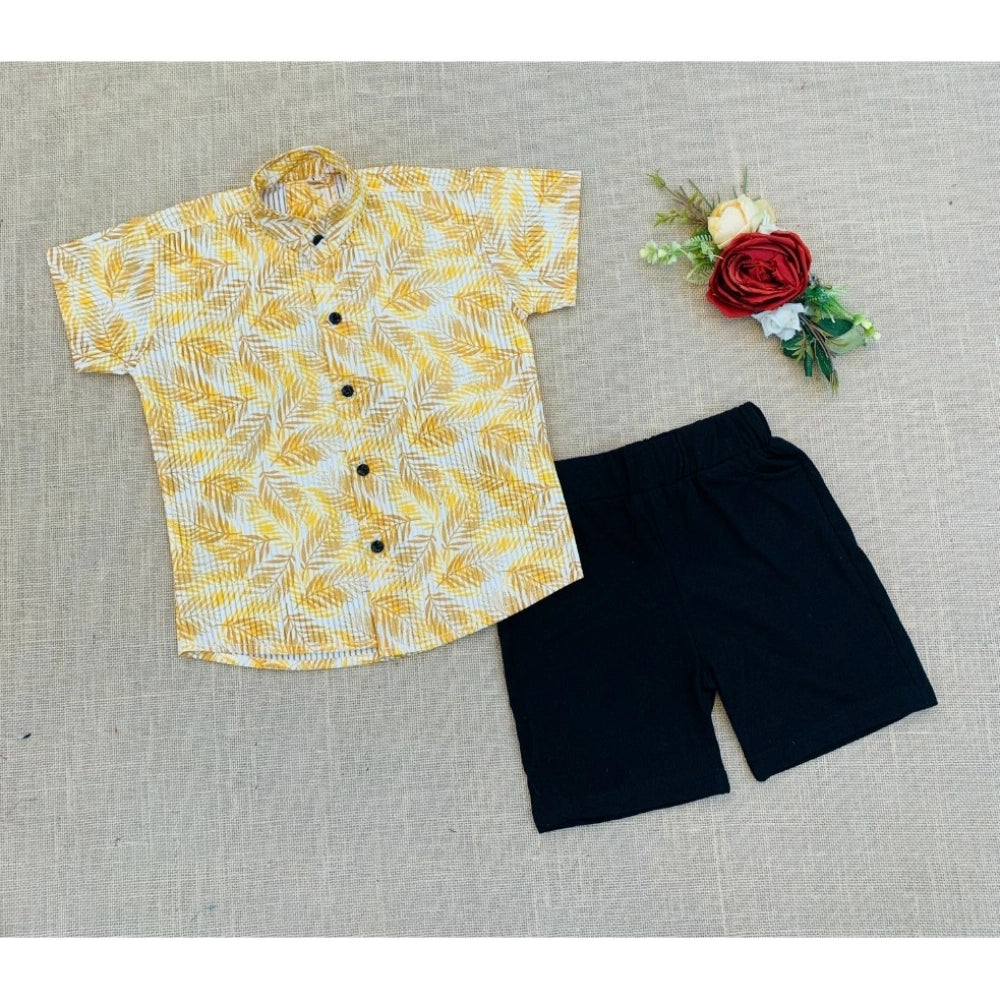 Multi-colored cotton blend boy's printed short sleeve shirt & shorts set, ideal for playtime