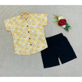 Multi-colored cotton blend boy's printed short sleeve shirt & shorts set, ideal for playtime