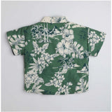 Green cotton blend printed short sleeve kid's shirt, vibrant pattern detail on display