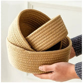 Brown cotton 3-piece round storage baskets for multi-purpose use, ideal for organizing clothes, bathroom, living room, kitchen, or kids' toys