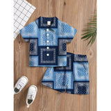 Blue twill cotton printed short sleeve shirt and shorts set for boys, casual summer outfit on a grassy background