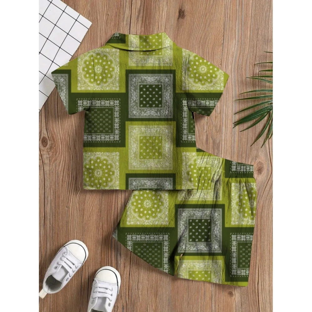 Green twill cotton printed shirt and shorts set for boys, casual summer outfit on display