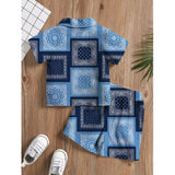 Blue twill cotton printed short sleeve shirt and shorts set for boys on display