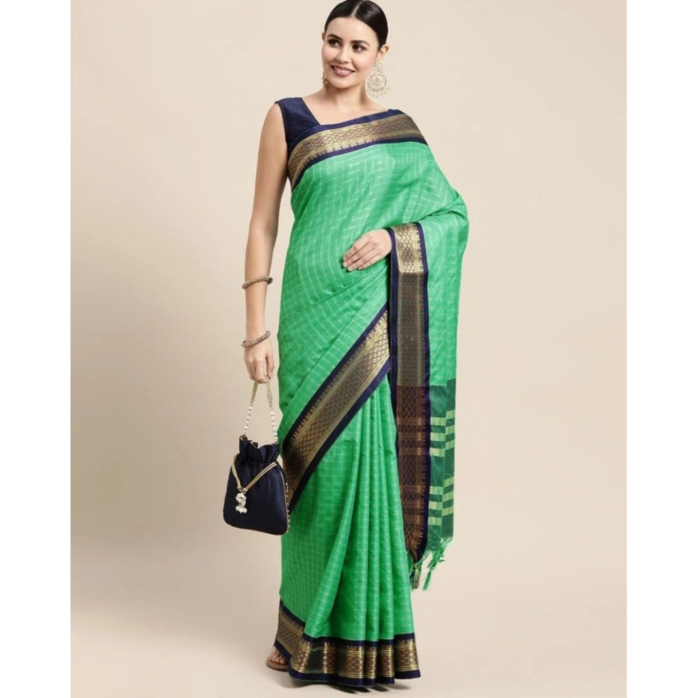 Green cotton silk checkered saree with unstitched blouse, traditional Indian wear accessory on display