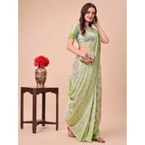 Light green cotton printed saree with unstitched blouse on mannequin, vibrant floral design