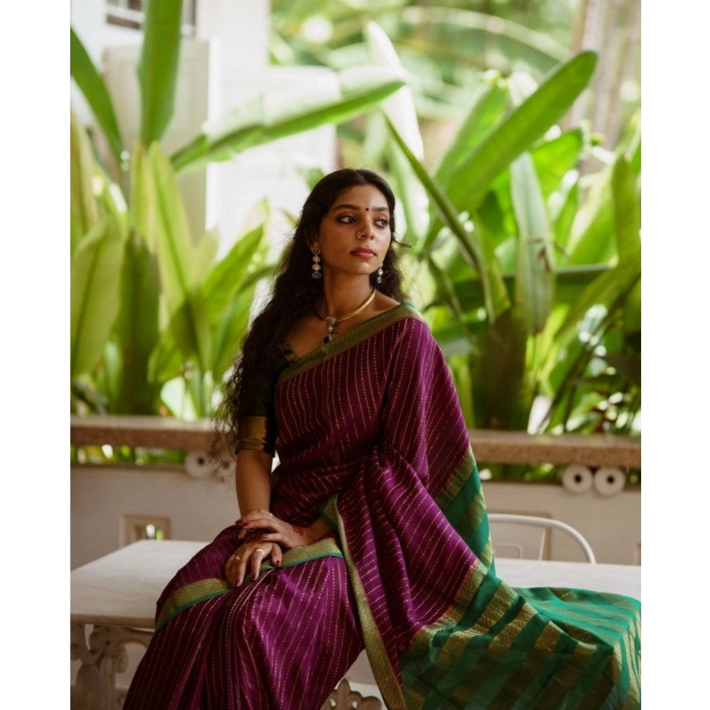 Women's wine silk printed saree with unstitched blouse, intricate design on display