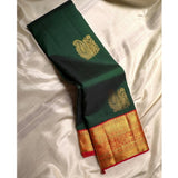 Green silk printed saree with unstitched blouse (5.5mtr), elegant South Asian women's fashion accessory on mannequin